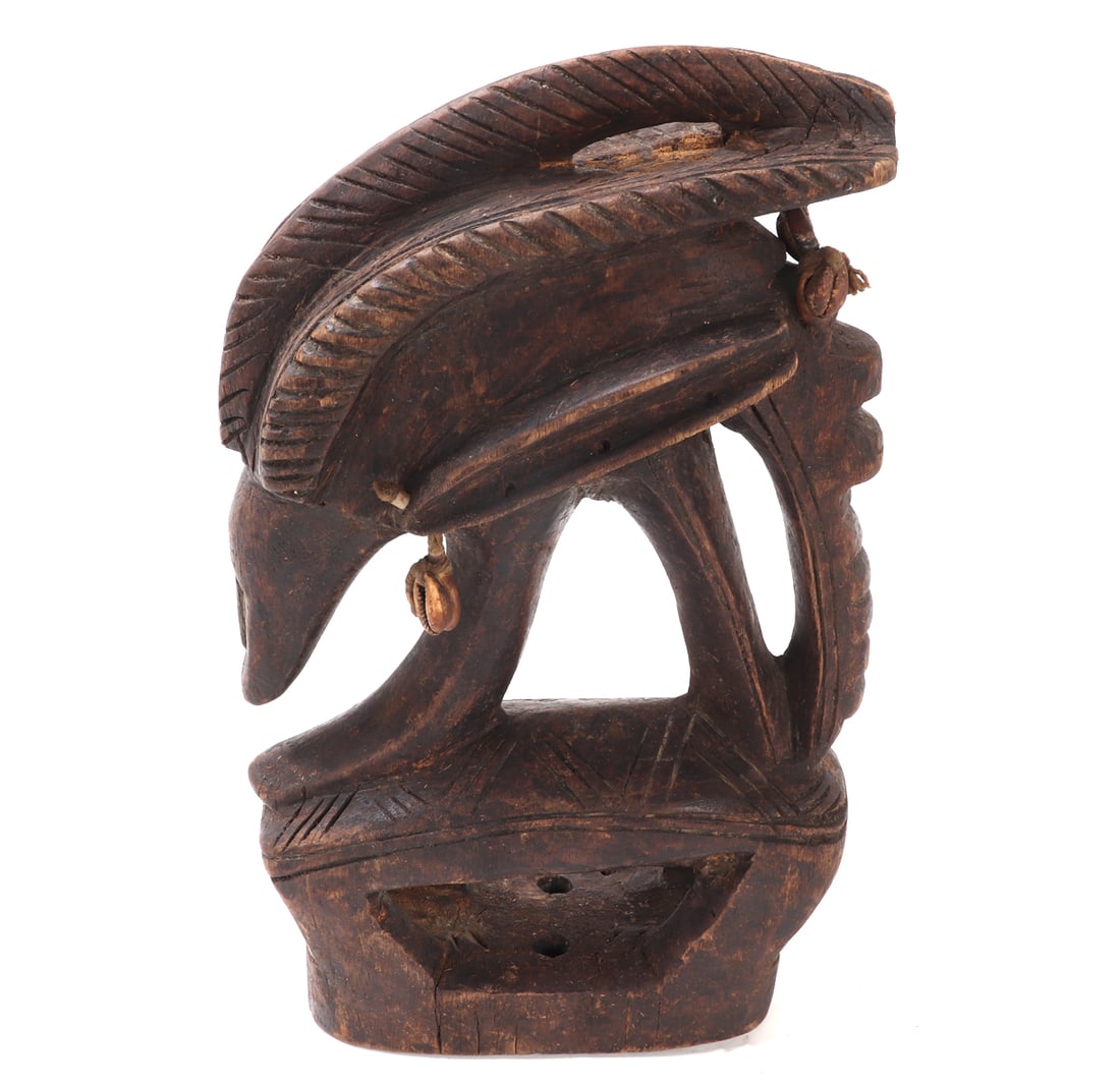 African Bamana Chi Wara Wood Antelope Headdress: Fine early 20th century African Bamana Chi Wara antelope dance wood headdress. Adorned with typical antelope style horns as well as incised geometric designs. Old tassels to the back top of the headdr