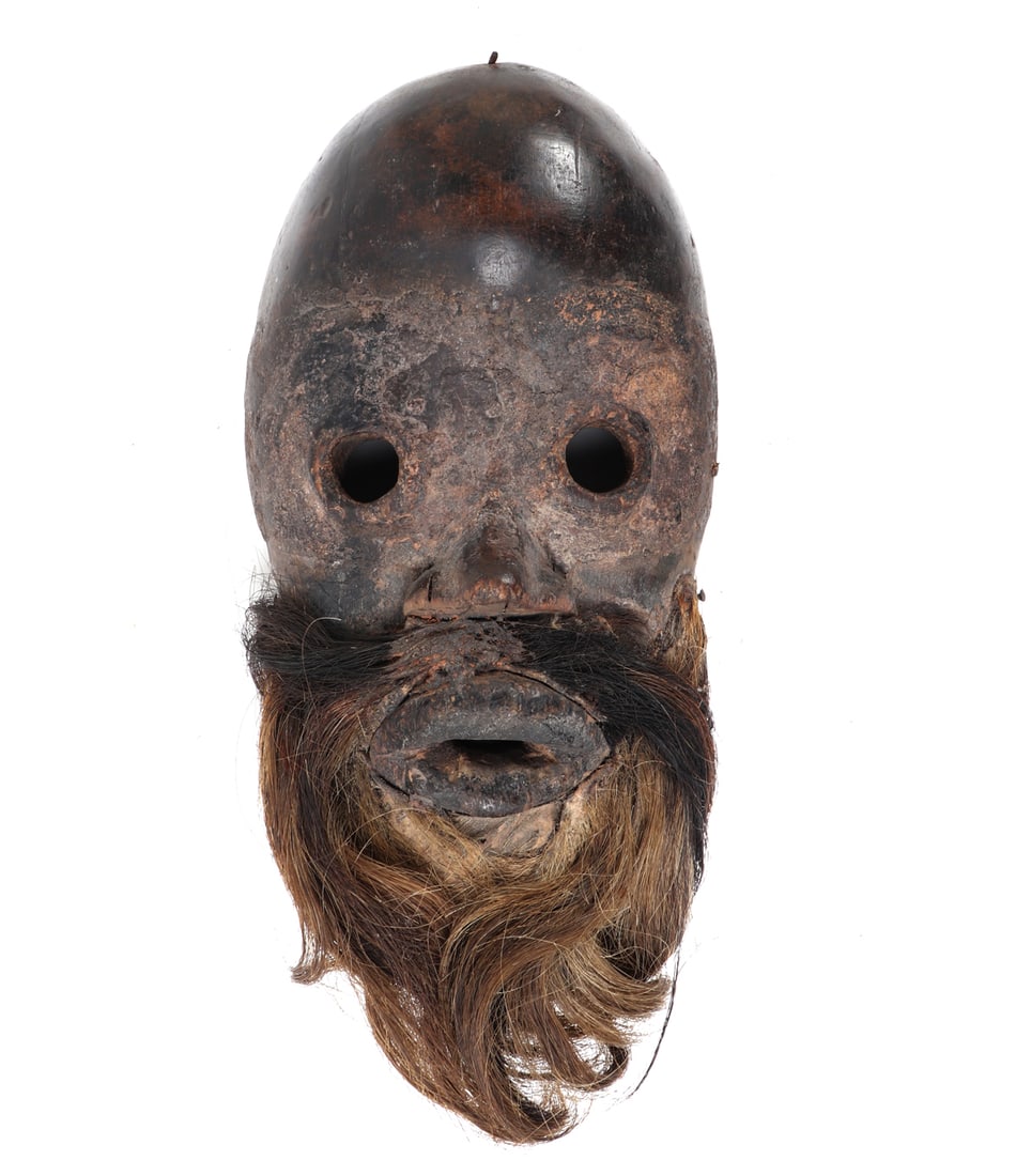 African Dan Bearded Wood Mask with Hair, Liberia / Cote d'Ivoire: Liberia / Cote d'Ivoire, Dan peoples, early to mid - 20th century, possibly earlier. Carved wood mask with rounded face, domed forehead, pierced circular eyes, projecting nose, and modeled mouth. The