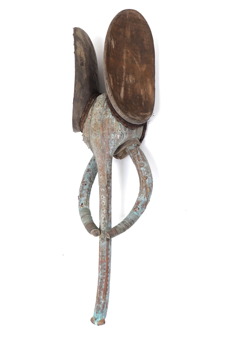 Cameroon Grassfields Copper-Covered Elephant Mask: Africa, Cameroon, Grassfields region, probably Bali peoples, mid-to-late 20th century. Large elephant mask carved in wood and sheathed in thin copper panels secured with copper pins, with incised and