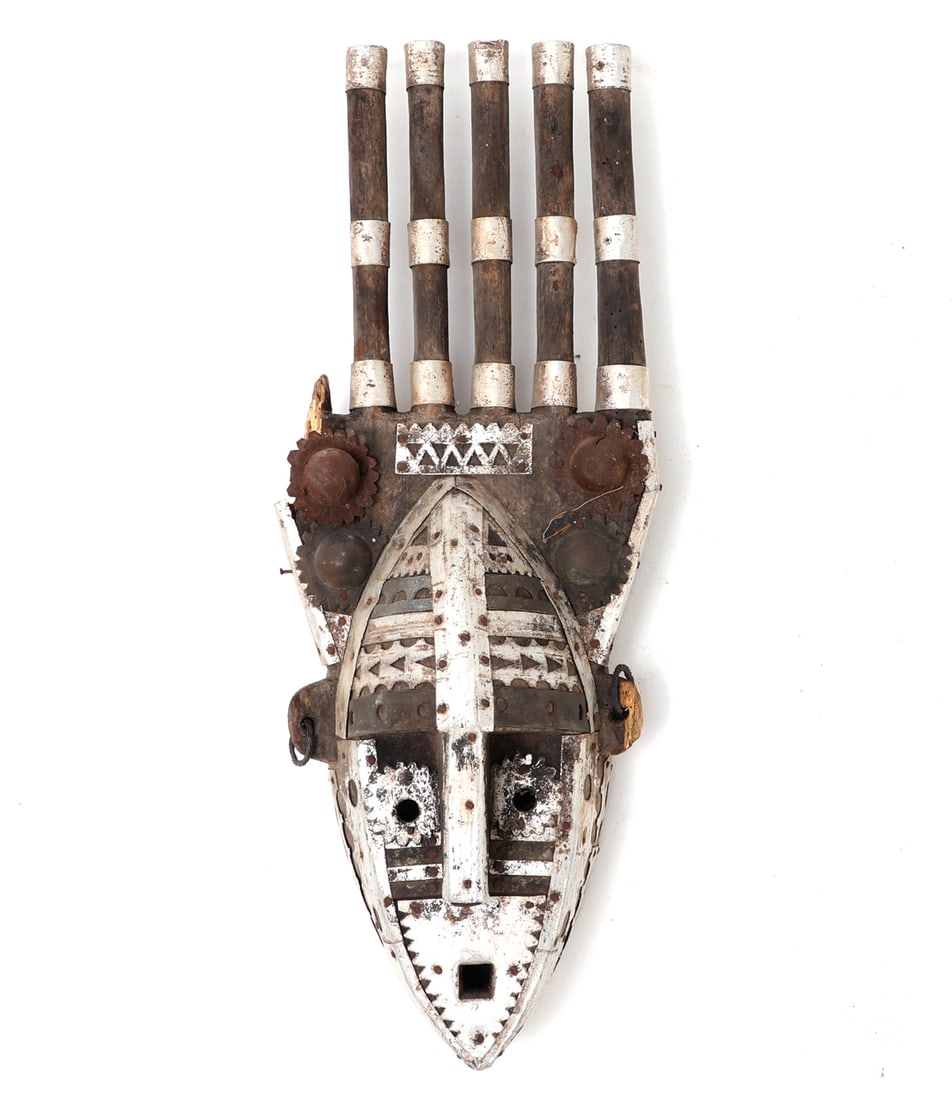 African Malinki Marriage Mask, Bamana: Bamana, ca. late 20th century CE. Wonderfully hand carved and intricately detailed Malinki marriage mask, covered with ornately stamped brass plates. Twisted rope earrings with five remaining finials