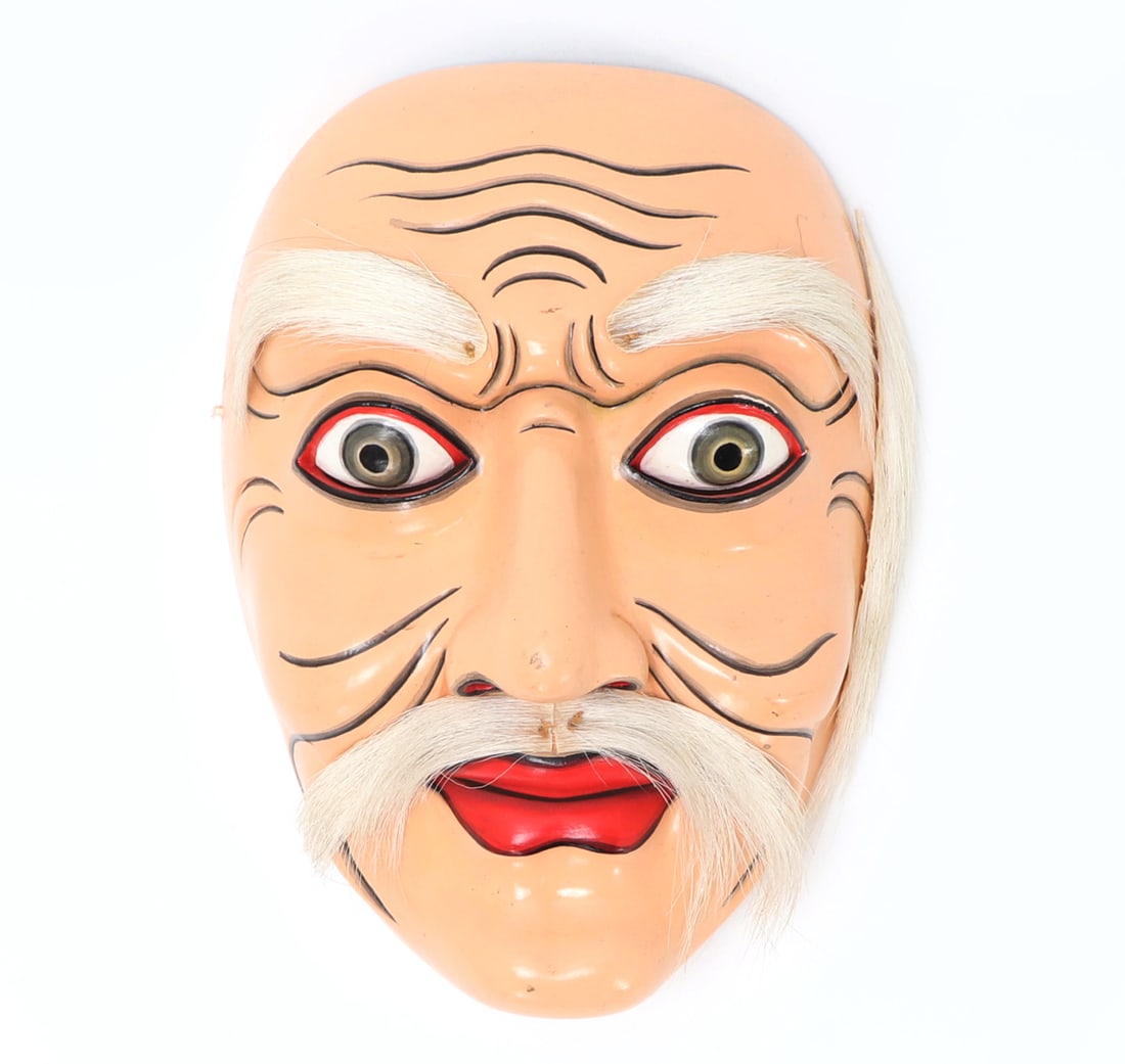 Balinese Carved and Painted Dance Mask 20th Century: Bali, Indonesia. Late 20th century (circa 1970s - 1990s) , Likely Ubud/Mas Region Balinese mask signed by artist I.B.Oka. Size 7 1/4" H x 5 1/2" W
