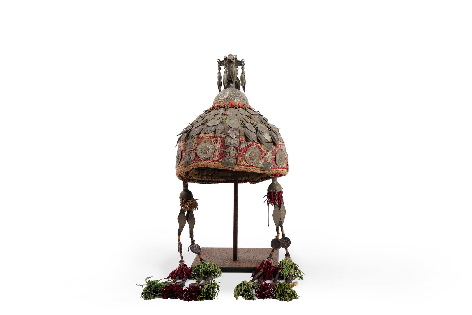 Turkmen Metal-Mounted Headdress, Azerbaijan: Azerbaijan, Turkmen tradition. Decorative headdress of domed form, richly mounted with metal plaques, pendants, and medallions over a textile ground, surmounted by a finial with suspended drops and