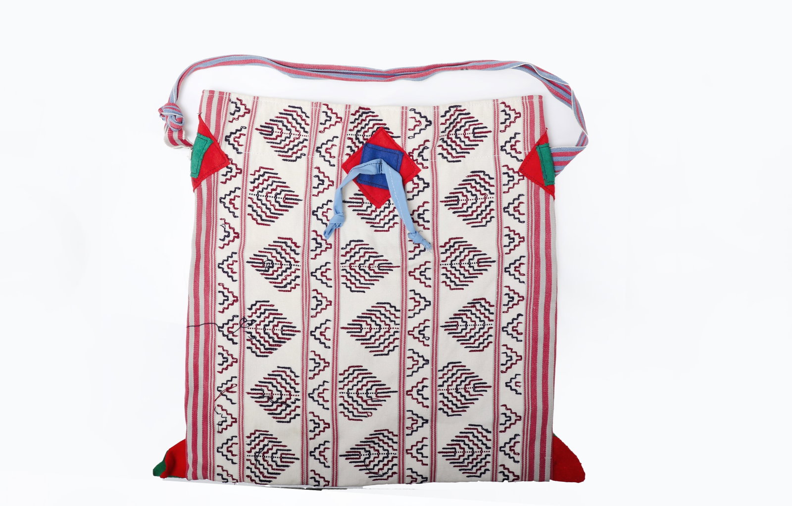 Beautiful Bhutan Bag Red, Pink Blue and Green: This vibrant Bhutanese woven bag showcases the bold color and geometric artistry characteristic of traditional Himalayan textiles. Crafted from durable handwoven fibers, the bag features striking