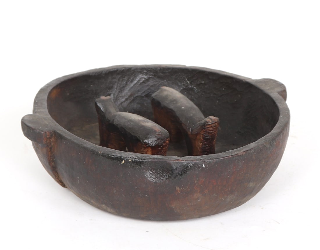 Andean / Peruvian Carved Wood Bowl with Twin Llamas: South America, likely Peru or Bolivia, 20th century. A carved wooden ceremonial-style bowl of shallow oval form, the interior fitted with two small standing llamas positioned side by side at the