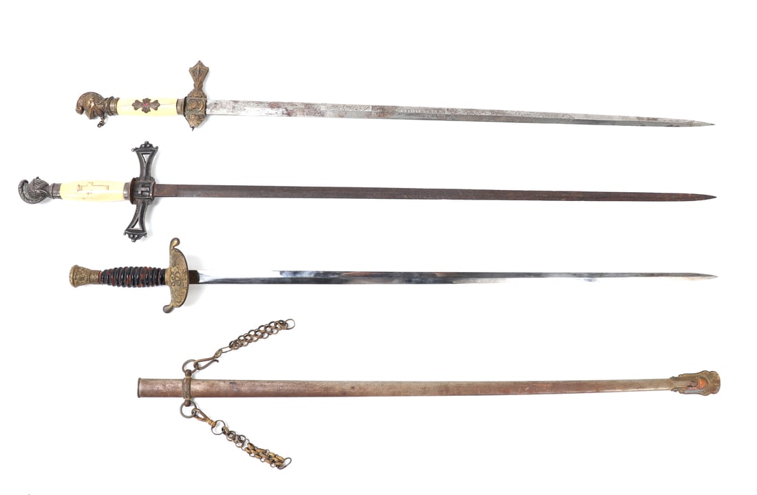 Lot of Three Masonic Sword: Three masonic sword with one retaining a scabbard. Each with wear or losses and one with an etched blade. Size 37" L, Blade 31" L