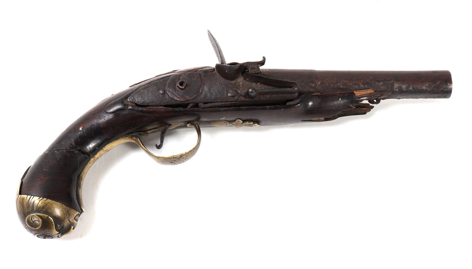 Continental Flintlock Belt Pistol w/ Brass Mounts, 18th-19th C.: Continental Europe, late 18th to early 19th century. Flintlock belt pistol with a round iron barrel, carved walnut stock, and engraved brass furniture including the trigger guard, side plate, butt