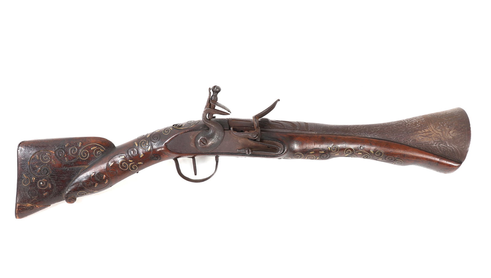 Ottoman Silver Inlaid & Engraved Flintlock Blunderbuss: Very unusual and ornate Ottoman flintlock blunderbuss pistol, 18th century with a well inlaid stock of scrolling patterns. The barrel is an extremely flared shape with a profusely engraved surface
