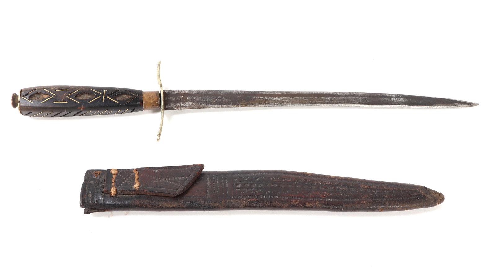 North African Inlaid Dagger with Leather Scabbard, 19th-20th C.: North Africa or Saharan region, possibly Tuareg, late 19th to early 20th century. Small dagger with a straight double edged iron blade, simple brass crossguard, and dark wood grip decorated with