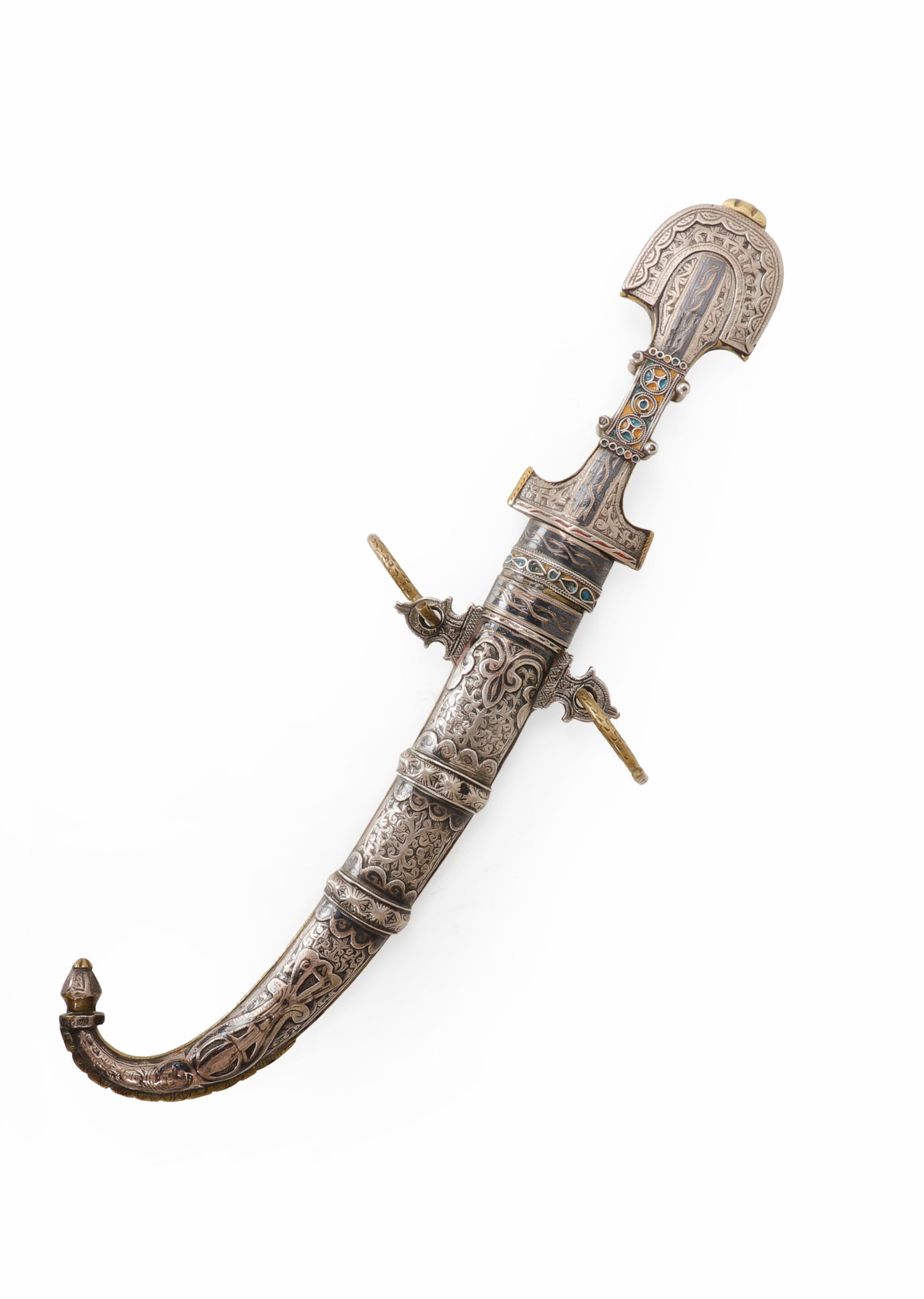 Moroccan Silver Niello Jambiya, 19th C.: Morocco, 19th century. A silver niello mounted Moroccan jambiya or koummya dagger with a curved single edged steel blade and decorated metal hilt. The grip is worked with chased and engraved