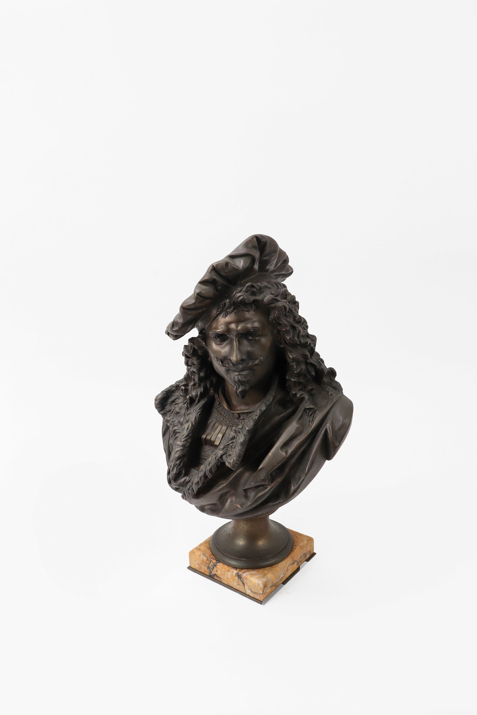 Bronze bust sculpture of Rembrandt Van Rijn: The sculpture depicts the Dutch Baroque painter Rembrandt by the French artist Albert Ernest Carrier-Belleuse. Super heavy. 20" tall 13" wide