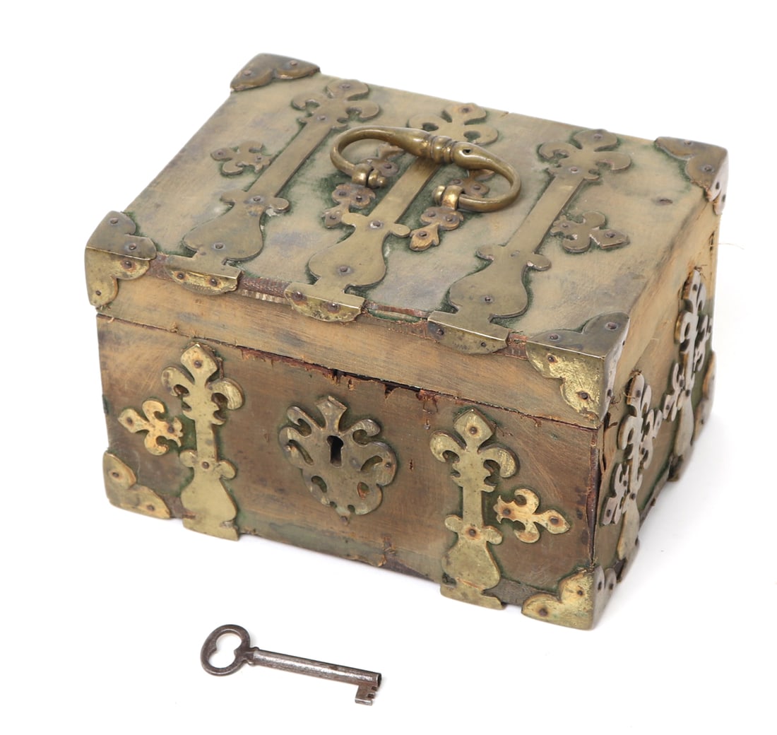 Gorgeous French Jewelry Casket, Circa 1600-1700: Gorgeous French jewelry casket circa 1600-1700. Gilt brass strap work of numerous fleur de Lis with copper pins. Constructed in wood with green velvet remnants to the exterior strapped in beautifully