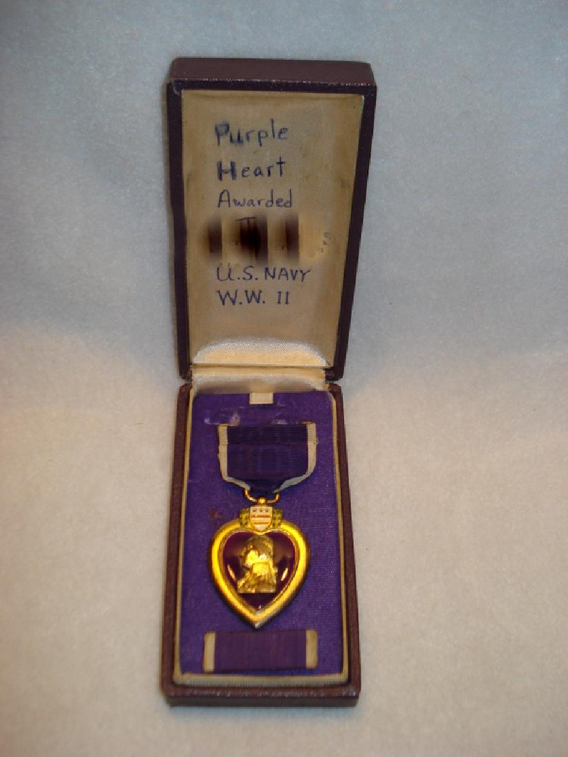 Cased Purple Heart medal on purple and cream colored (1 of 7)