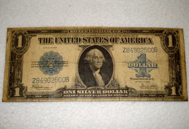A 1923 $1 Blue Seal Silver Certificate serial number (1 of 3)