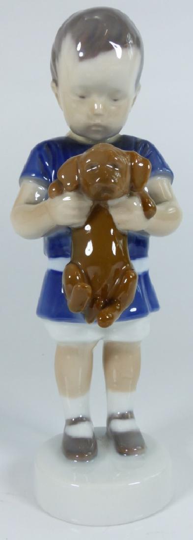 BING & GRONDAHL COPENHAGEN PORCELAIN BOY w DOG: B & G Copenhagen boy with dog porcelain figurine #1747. Marked to bottom. Measures 7" (17.5cm) height.