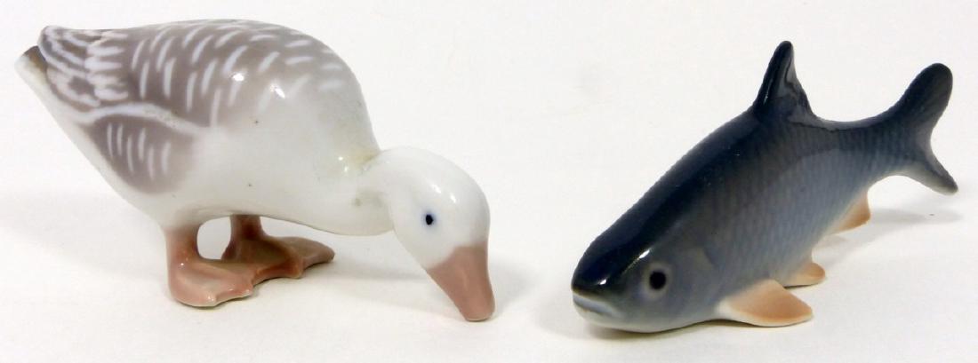 2pc B&G COPENHAGEN PORCELAIN FISH & GOOSE FIGURES: Bing & Grondahl Copenhagen porcelain figurines depicting a fish #2145 and gray goose #1902. Each marked to underside. Goose measures 3 1/2" (9cm) length.