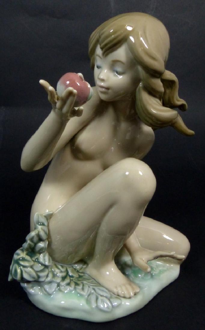 LLADRO 'EVE' PORCELAIN FIGURINE w BOX: Lladro porcelain figure depicting a nude girl with apple in hand. Titled 'Eve' #1482. Marked to underside and measures 7 1/2" (19cm) height. Includes original box.