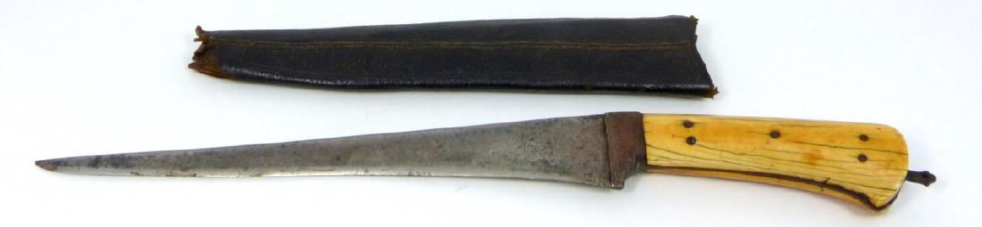 ANTIQUE PERSIAN PESH-KABZ DAGGER: Antique Persian Pesh-kabz dagger with bone handle and full tang steel blade. Includes leather covered scabbard. Measures 14" (35.5cm) length.