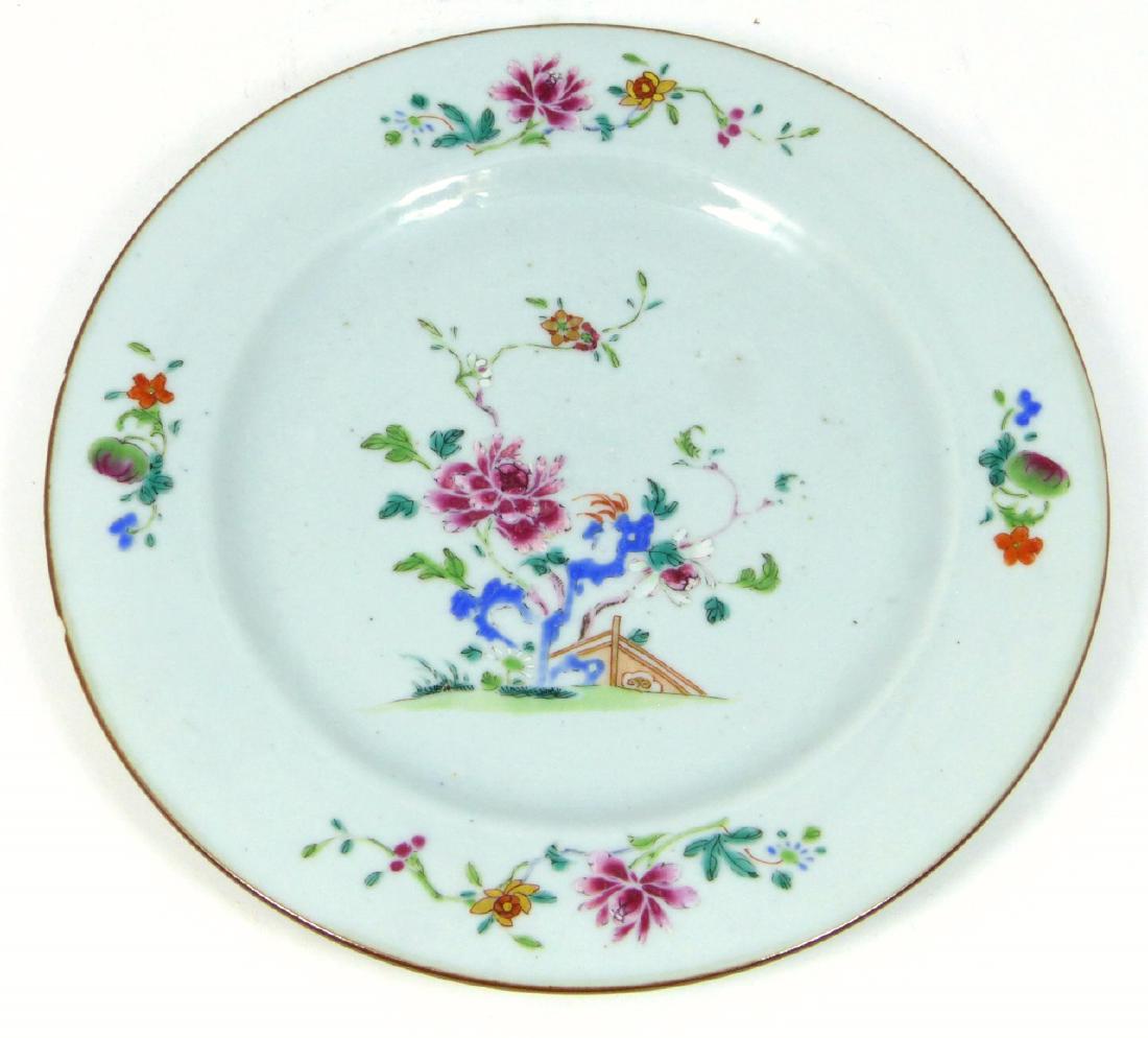 CHINESE ANTIQUE FAMILLE ROSE PORCELAIN PLATE: Chinese antique Famille Rose porcelain plate having a floral motif and brown glazed edge. Measures 9" (23cm) diameter.