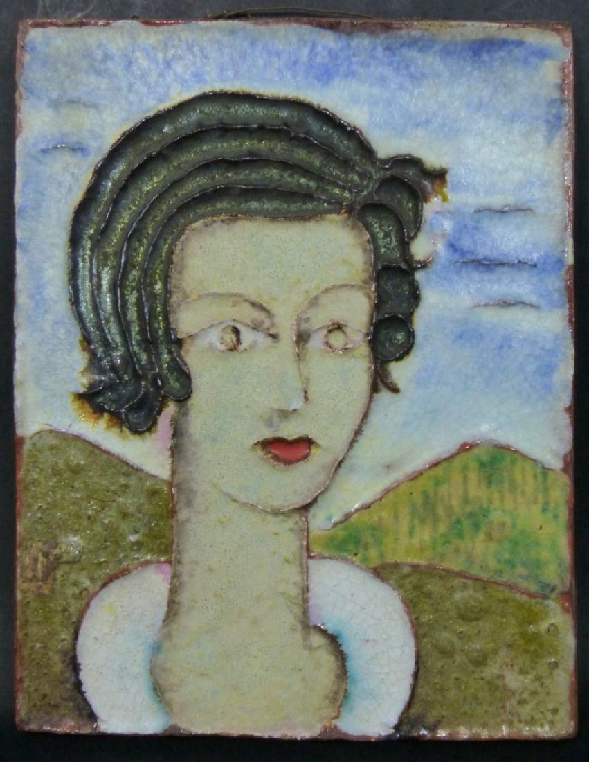GOLDSHEIDER AUSTRIAN POTTERY PORTRAIT PLAQUE: Goldsheider terracotta pottery plaque depicting the face of a young woman. Impressed to backside. Measures 12" (30.5cm) x 9 1/2" (24cm).