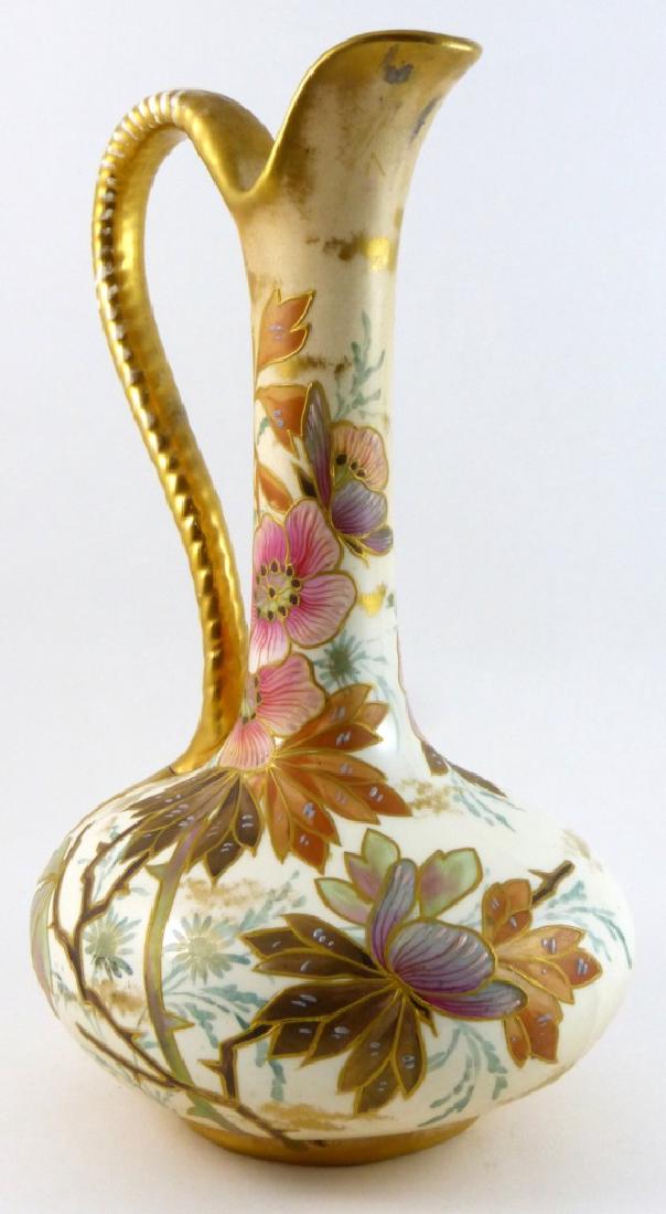 ROYAL BONN FRANZ ANTON MEHLEM PORCELAIN PITCHER: Royal Bonn Franz Anton Mehlem porcelain pitcher with hand painted floral decoration and gilt accents. Marked and impressed to underside. Measures 10" (25.5cm) height.