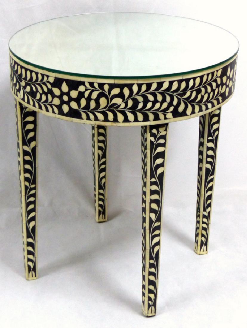 MOROCCAN BONE INLAID MIRROR TOP SIDE TABLE: Moroccan camel bone inlay round mirror top side table with scrolled vine and flower motif. Measures 23 1/4" (59cm) height x 20" (51cm) diameter.