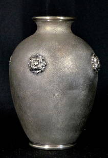 MARIO BUCCELLATI 800 SILVER VASE: Mario Buccellati Italian .800 silver cabinet vase. Brushed textured finish to body with four rosettes. Marked to underside. Measures 4 3/8" (11.2cm) height. Total weight 5.1ozt (158.5g).