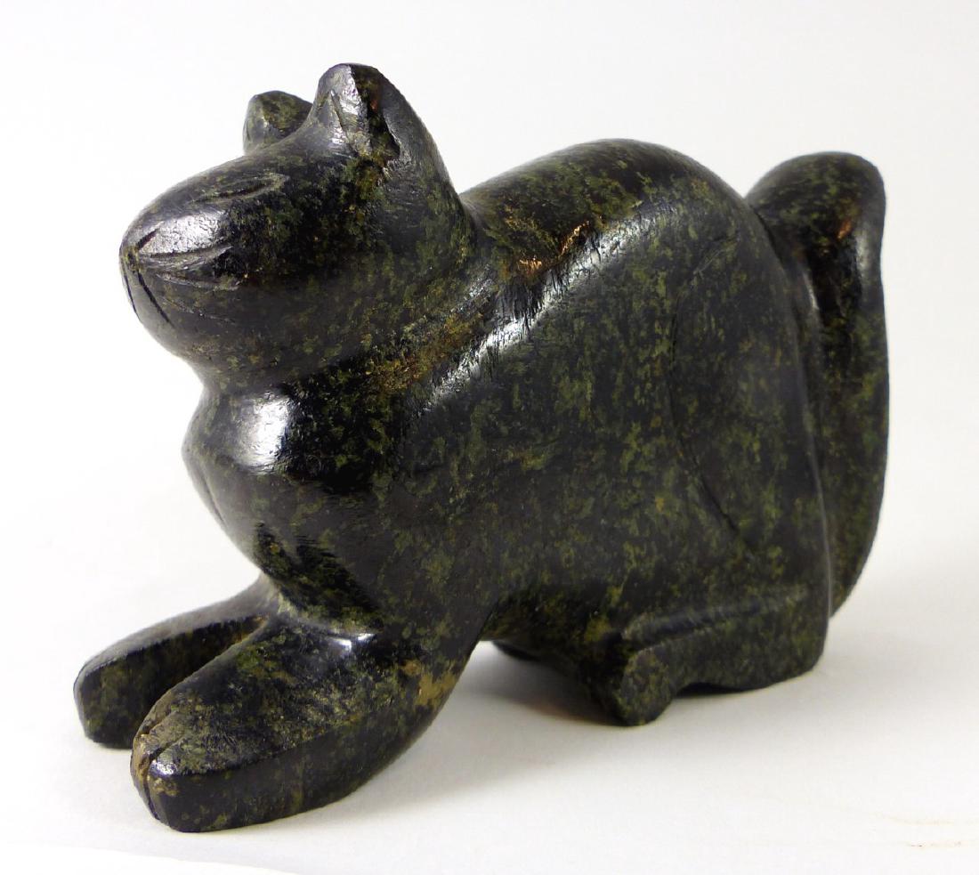 INUIT CARVED SERPENTINE CAT SCULPTURE: Inuit serpentine carving depicting a cat. Measures 4 1/2" (11.4cm) length.