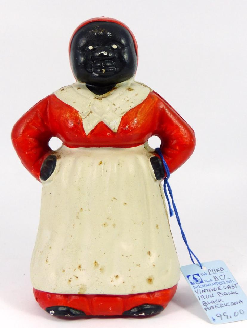 VINTAGE PAINTED CAST IRON AUNT JEMIMA BANK: Vintage painted cast iron Black Americana Aunt Jemima bank or door stop. Measures 7 1/8" (18cm) height.