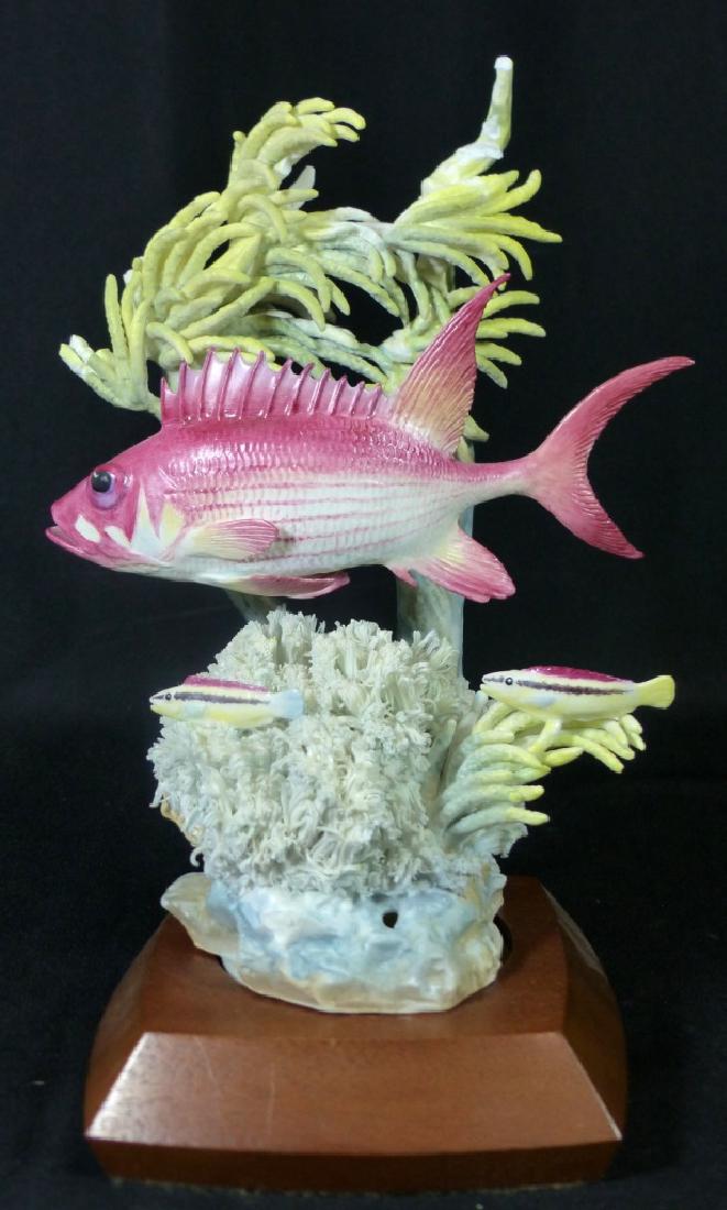 ROYAL WORCESTER SQUIRRELFISH PORCELAIN SCULPTURE: Royal Worcester 'Squirrelfish' porcelain figurine modeled by Ronald Van Ruyckevelt, 1961. Marked to underside and numbered 464/500. Includes fitted wooden base. Measures 9 1/2" (24cm) height