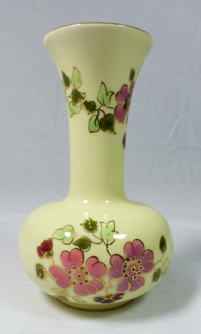 ZSOLNAY PECS PORCELAIN VASE: Zsolnay pecs porcelain vase with floral motif. Marked to underside. Measures 4 1/2" (11.4cm) height.