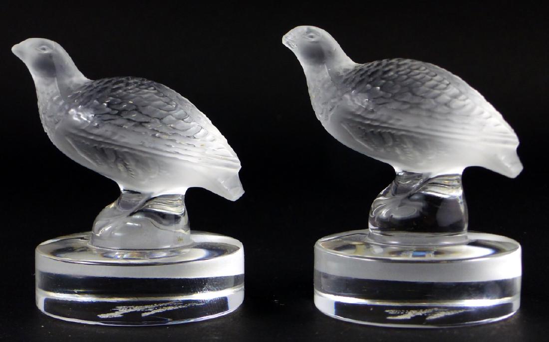 2pc LALIQUE FRENCH CRYSTAL PARTRIDGE CARD HOLDERS: 2 Lalique France frosted crystal place card holders in the form of partridge birds. Each signed to underside and measures 2 3/8" (6cm).