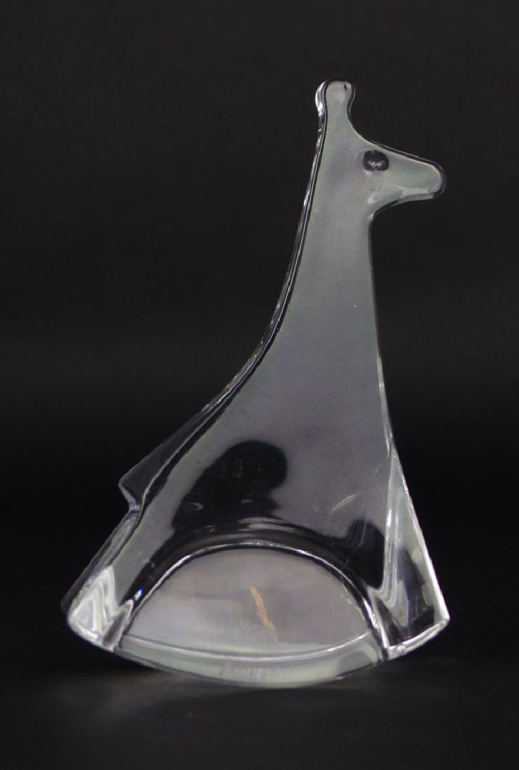 BACARRAT CRYSTAL GIRAFFE ON ROCKER: Baccarat crystal rocking giraffe. Marked to underside and signed to lower side. Measures 4 1/8" (10.5cm) height.