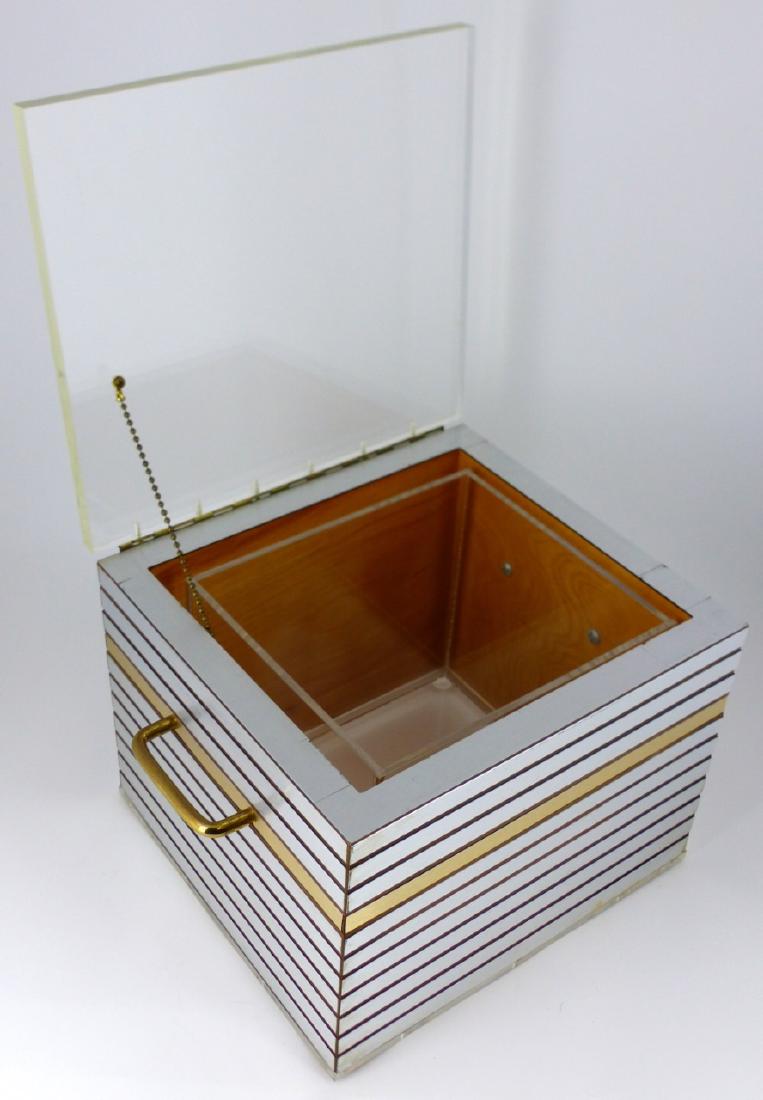 MID-CENTURY NICKEL, BRASS & LUCITE ICE BUCKET: Mid-century ice bucket having lucite lid and base with removable acrylic insert. Exterior brushed nickel and brass over wood with brass handles and hinges. Probably MCM, Italian. Measures 12 1/2" (31.