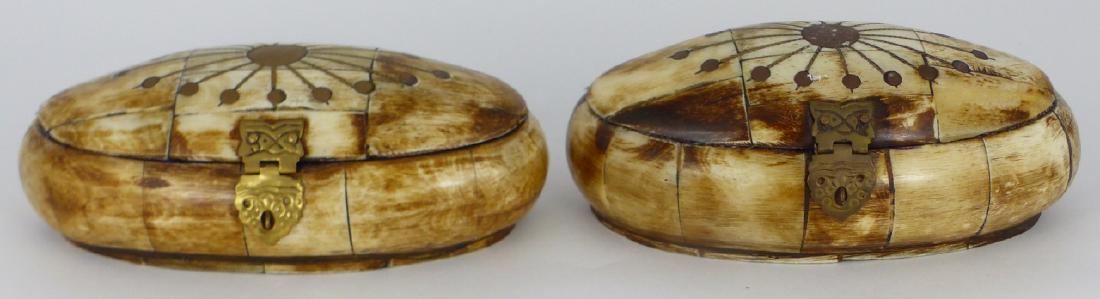 PR CAMEL BONE BOXES w BRASS INLAY: Pair of camel bone boxes with brass hardware and inlay. Each measures 5 3/4" (14.5cm) length.