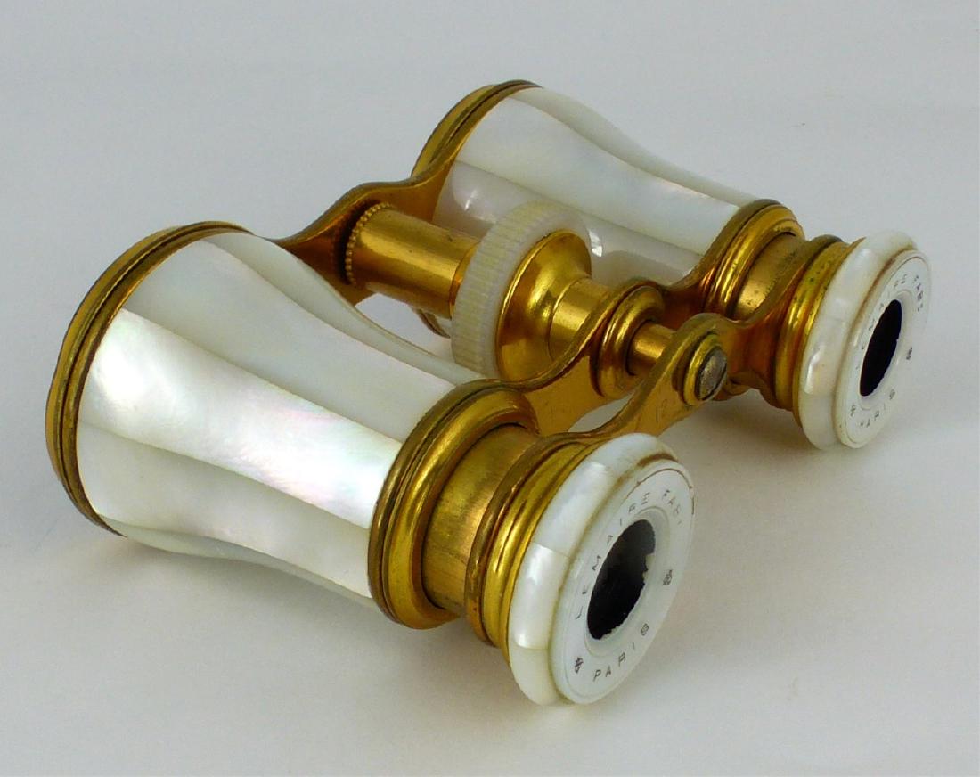 LEMAIRE FABI FRENCH MOTHER OF PEARL OPERA GLASSES: Lemaire Fabi Paris mother of pearl opera glasses. Marked. Measures 3 3/4" (9.5cm).