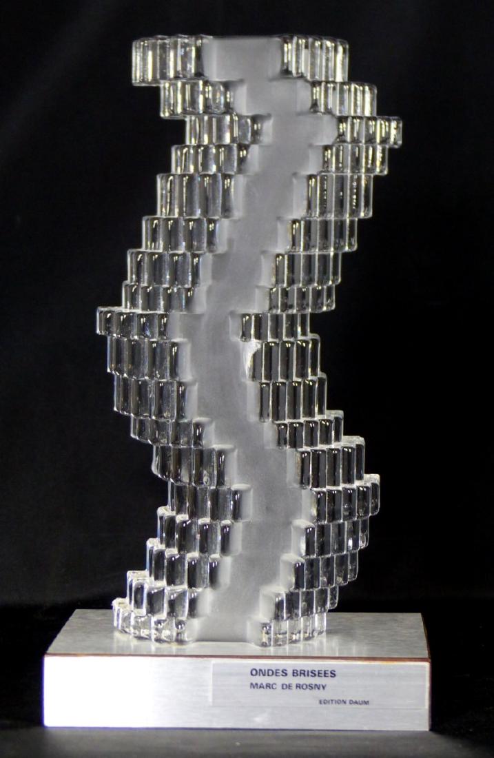 DAUM 'BROKEN WAVES' GLASS SCULPTURE MARC DE ROSNY: Marc de Rosny for Daum abstract glass sculpture titled 'Ondes Brisees' or broken waves. Signed Daum and De Rosny to lower backside. Measures 10 3/4" (27.5cm) height + 1 1/4" (3cm) base.