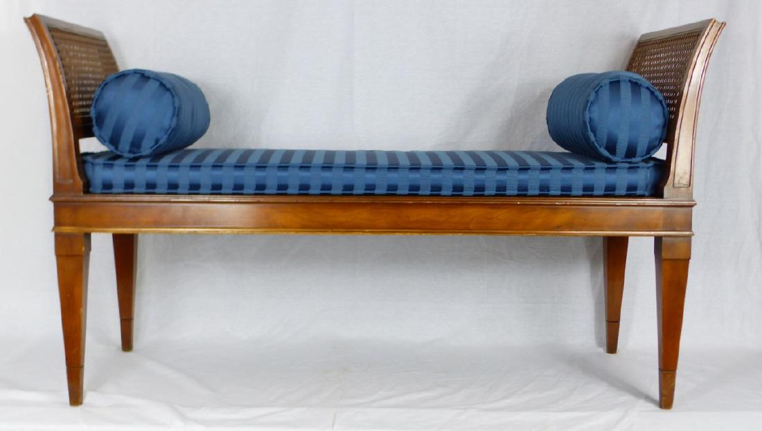 CANED WOODEN WINDOW BENCH: Caned wooden window bench. Measures 45 1/2" x 26" x 18 1/2".