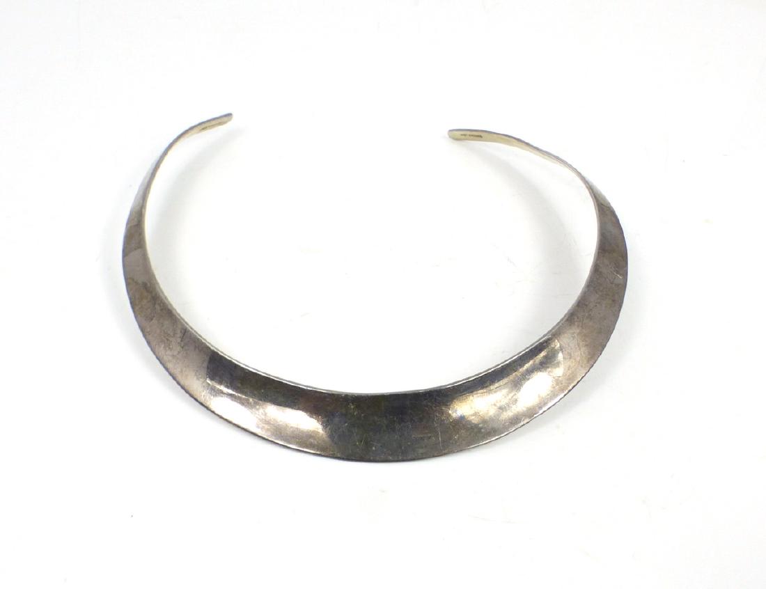 FINNISH STERLING SILVER CHOKER: Finnish sterling silver choker. Marked 925, A, X7, Finland with artist's illegible initials. Measures 4 3/4" (12cm) width. Total weight 1.24ozt (38.5g).