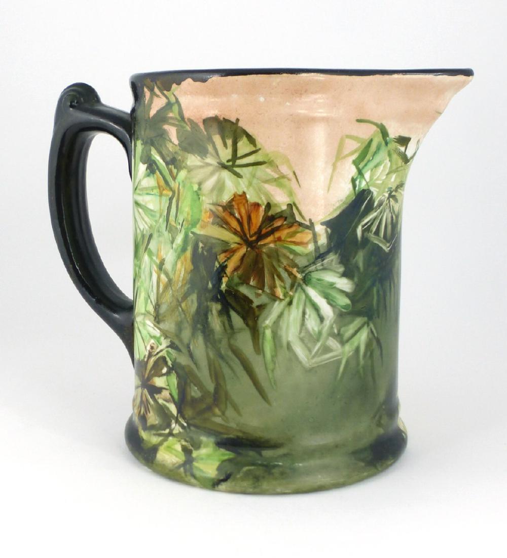 JOHN MADDOCK ROYAL VITREOUS PORCELAIN PITCHER: John Maddock Royal Vitreous pitcher having hand painted floral design. Marked to underside. Measures 7" (18cm) height.