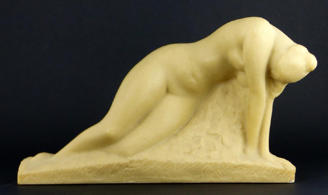 VINCENT GLINSKY RECLINING NUDE SCULPTURE: Vincent Glinsky (American, 1895-1975) sculpture of a reclining nude woman. Signed to side, below feet. Measures 12 1/4" (31cm) length.