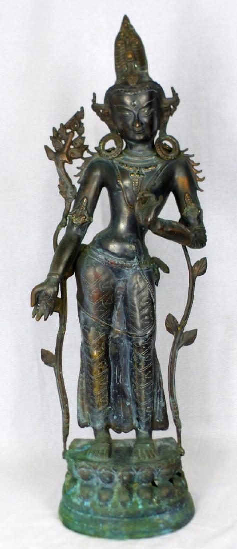LARGE CHINESE BRASS QUAN YIN SCULPTURE: Large Chinese patinated brass sculpture of Guan Yin standing atop double lotus blossom throne. Measures 32 1/2" (82.5cm) height.