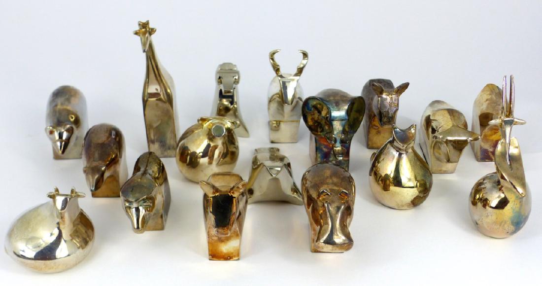 17pc DANSK SILVER PLATED ANIMAL PAPERWEIGHTS: Collection of 17 Dansk silverplate animal figurines. Includes pig, giraffe, seahorse, elephant, deer, seal, bear, donkey, rabbit, ram, cat, polar bear, ox and others. Each marked to underside. Giraffe