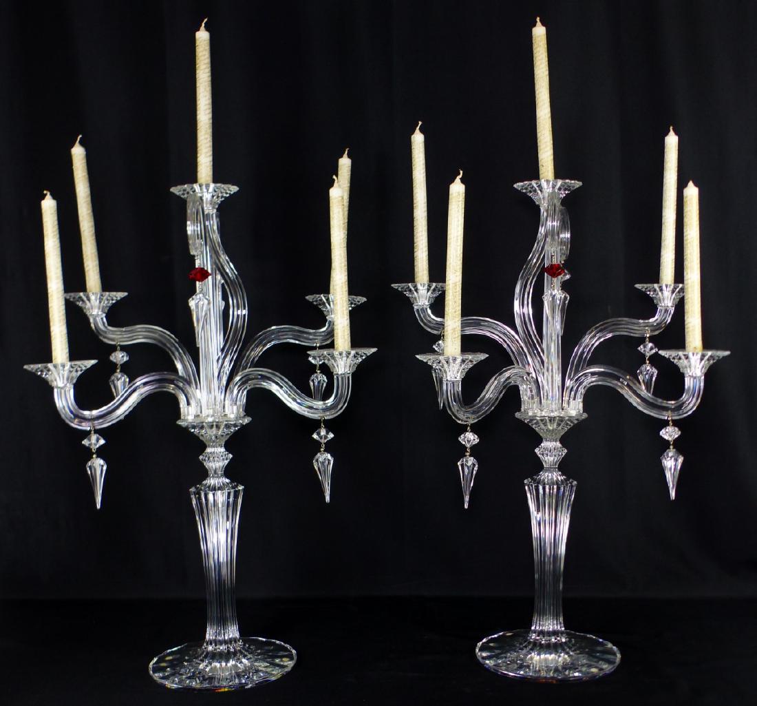 PR BACCARAT MILLE NUITS 5-LIGHT CANDELABRA: Pair of Baccarat French cut crystal candelabra featuring a baroque motif with five beveled cut arms at alternating heights amidst two decorative crystal swirls. Each marked to base Baccarat Mathias an