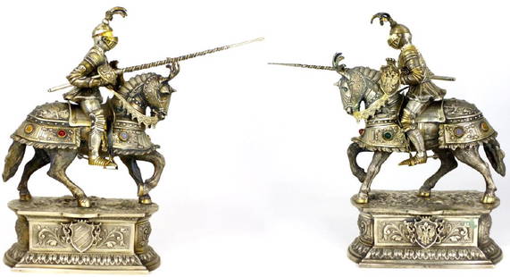 PR GERMAN 800 SILVER JOUSTING KNIGHTS: Pair of German 800 silver knights on horseback. Each in full armor with lance, shields and inset gemstones. Each marked to side of base. Probably Hanau. Each measures approx 12" (30.5cm) height x 12"