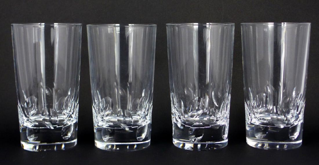 4pc CHRISTOFLE 'CLUNY' CRYSTAL HIGHBALL GLASSES: 4 piece Christofle crystal tumblers in the Cluny pattern. Each marked to underside and measures 5 1/4" (13.3cm) height.