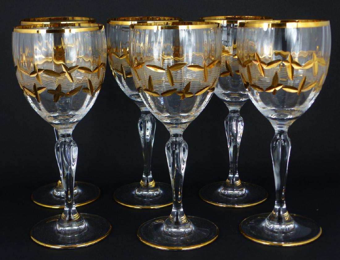6pc GILT & CUT CRYSTAL WINE GOBLETS: 6 cut crystal wine goblets with gilt decoration and lobed stem. Each measures 7 1/2" (19cm) height.