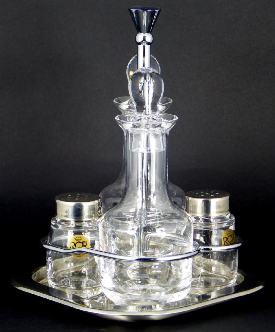 5pc ROYAL CRYSTAL ROCK CRUET SET: Royal Crystal Rock cruet set for oil, vinegar, salt and pepper. Includes two bottles, two shakers and stand. Stand measures 8 1/2" (21.5cm) height.