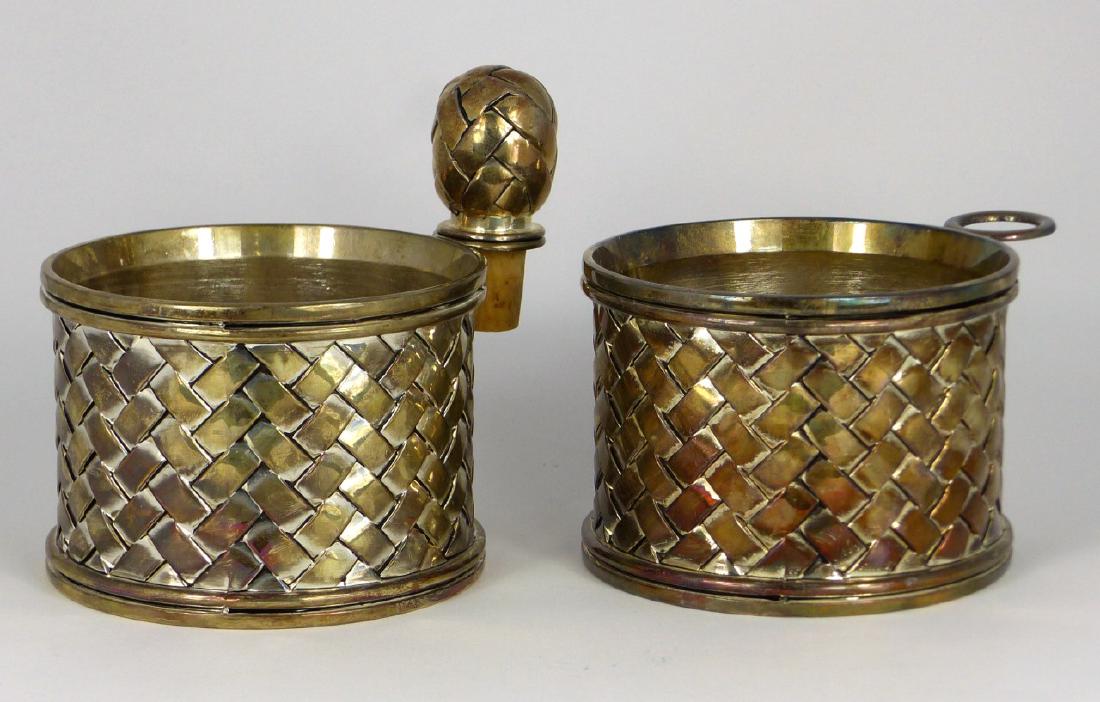 3pc GODINGER WINE BOTTLE HOLDERS & STOPPER: A pair of Godinger silver plated wine bottle holders with cork inserts and matching stopper. Holders are marked to underside and measure 5 3/4" (14.5cm) length.
