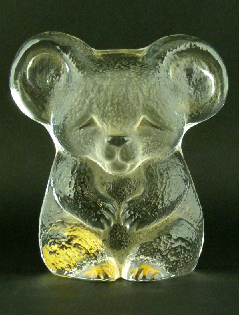 KOSTA BODA CRYSTAL KOALA BEAR: Kosta Boda art glass koala bear figure. Signed to underside. Holds original label to verso. Measures 5 1/4" (13.3cm) height.