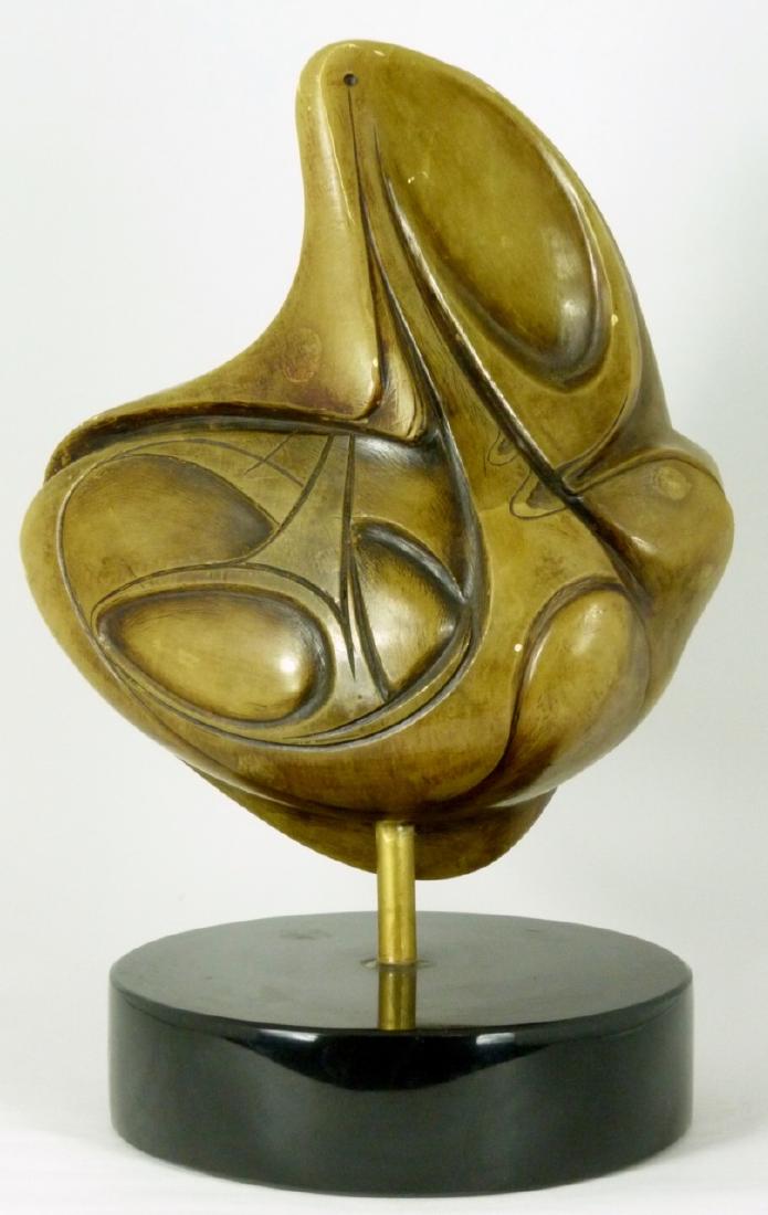 PENA LATIN AMERICAN ABSRACT CARVED STONE SCULPTURE: Abstract carved stone sculpture. Signed Peña and dated 2004. Overall height with marble base 13 1/2" (34cm). Sculpture measures 10" (25.5cm) height.